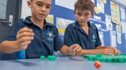 Students using counting bricks
