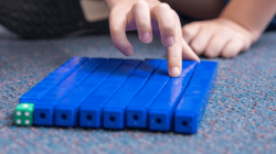 Students using counting bricks