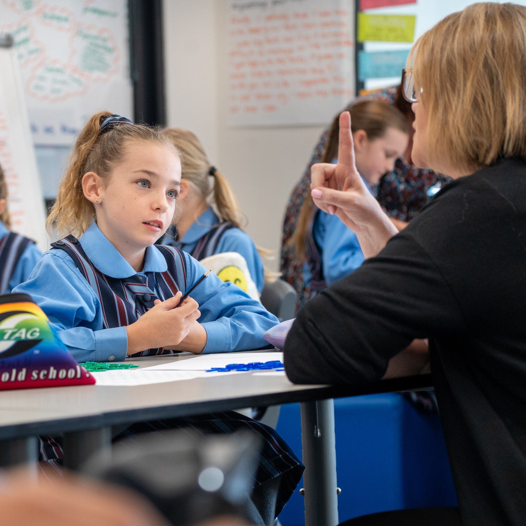 Student looking at teacher
