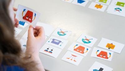 Students play their building bots game