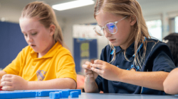 Students using counting bricks