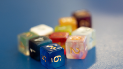 10 multi-coloured, cube dice 