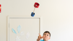 Student throwing a loopy aeroplane