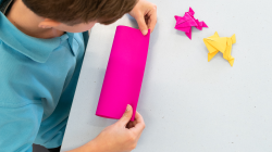 Students folding paper