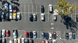 Cars in a supermarket parking lot