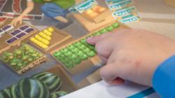 Student pointing at the reSolve Market
